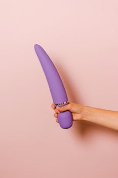 hand holding a vibrator