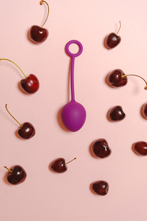Free Sex Toy and Cherries Stock Photo