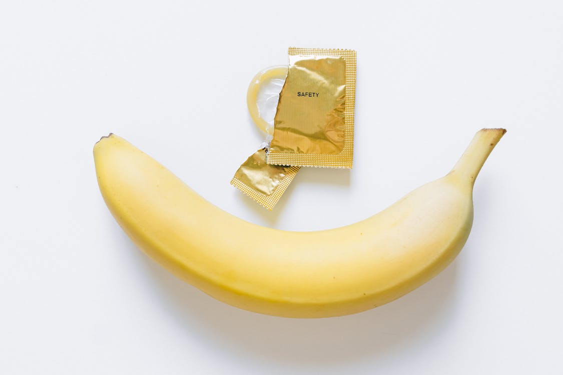 Condom Next to Yellow Banana