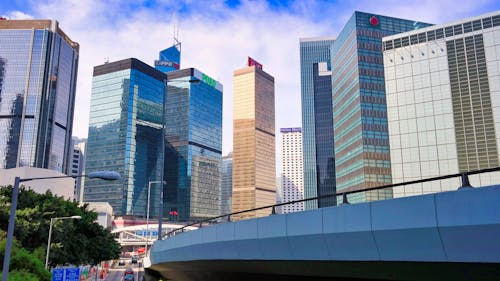 Cloudy Sky over City Buildings