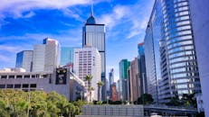 Blue Sky and White Clouds above High-rise Buildings