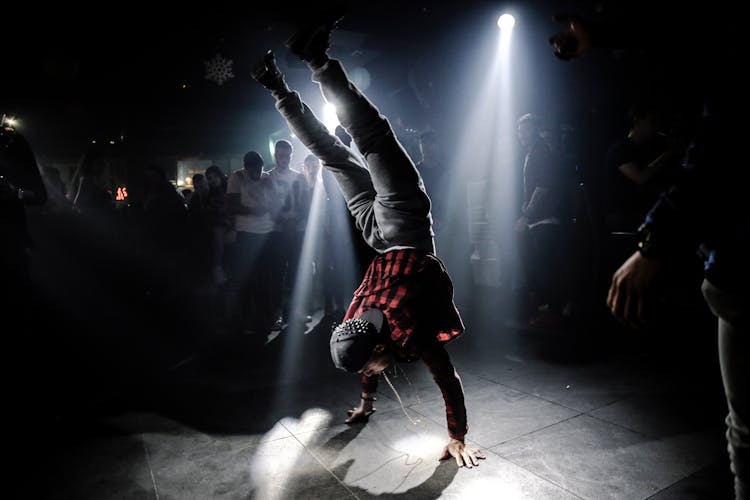 Man In Plaid Shirt Breakdancing