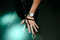 Person Wearing Silver Link Bracelet Round Analog Watch