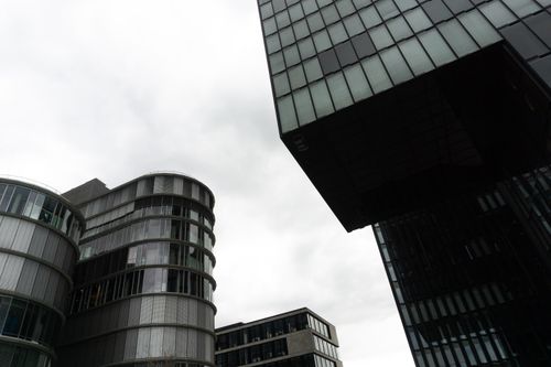 Free Contemporary buildings under a cloudy sky in Düsseldorf's urban center. Stock Photo