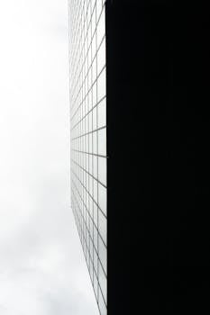Low angle view of a skyscraper with a grid pattern in Düsseldorf, Germany.