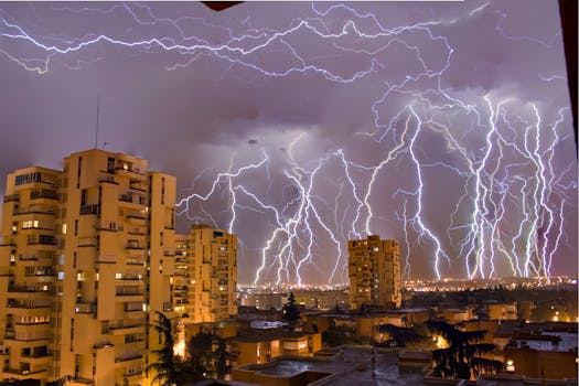 Majestic view of lightning storms illuminating Madrid's skyline at dusk.