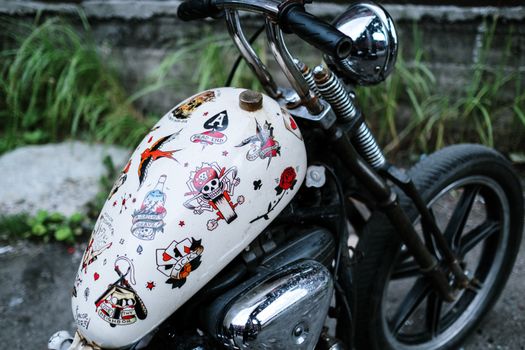 White Motorcycle with Stickers