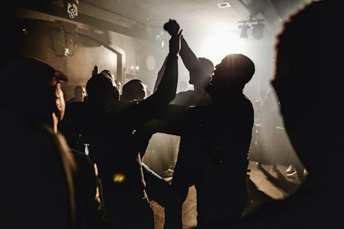 Silhouettes of People Dancing in Nightclub