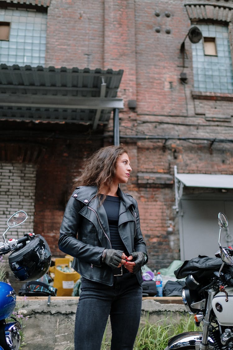 Woman In A Leather Jacket Looking Sideways