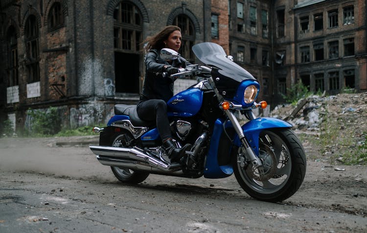 A Woman Riding A Big Motorcycle