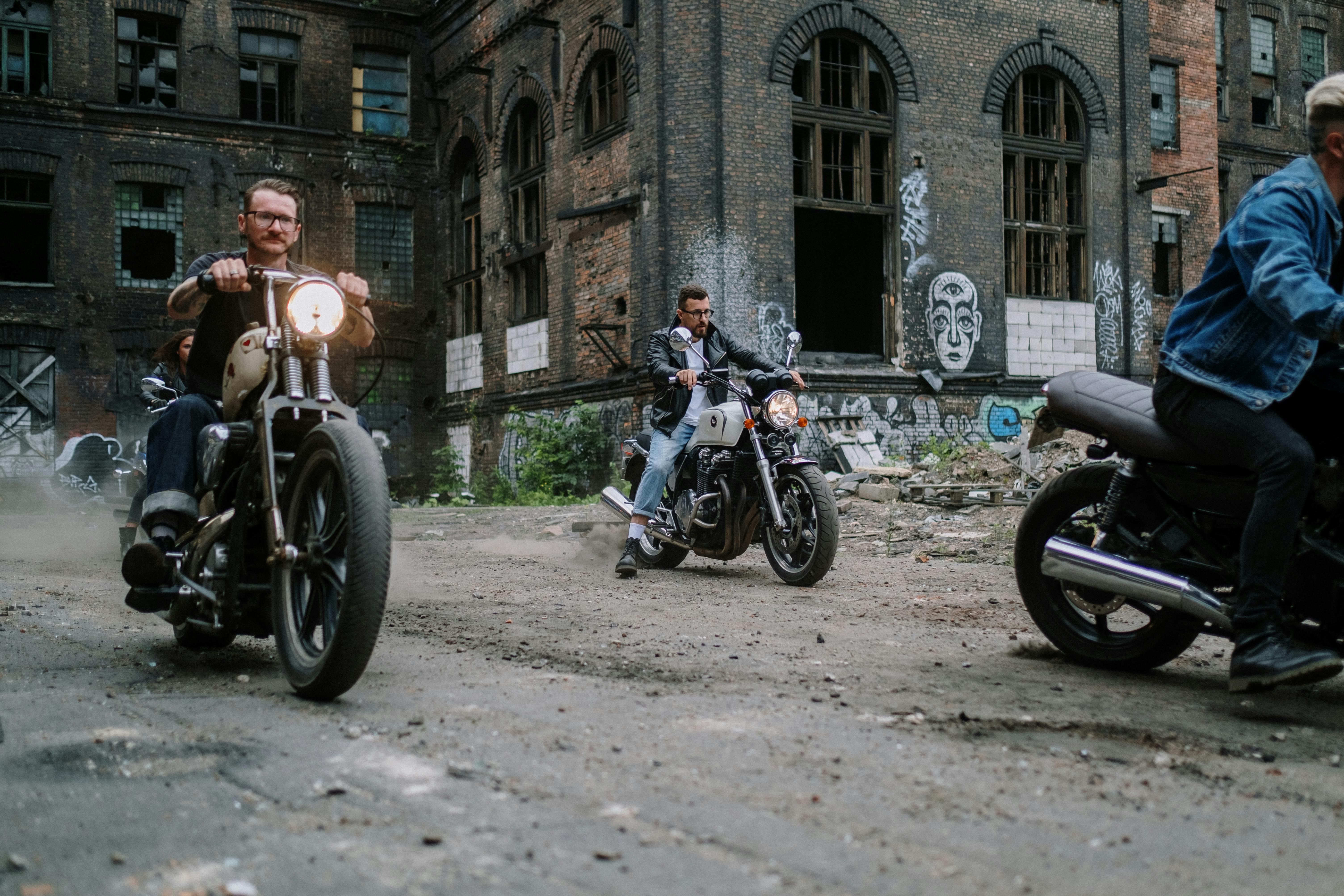 man in black jacket riding on motorcycle