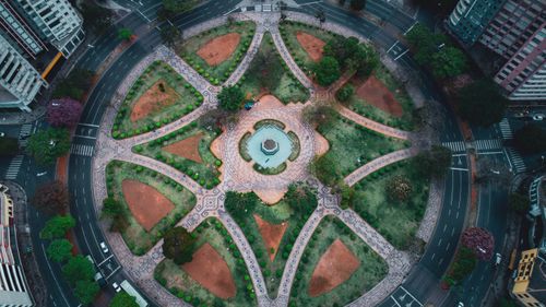 Free Stunning aerial shot of Praça da Liberdade in Belo Horizonte, showcasing its circular design and urban landscape. Stock Photo