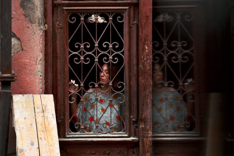 Woman Standing On Door