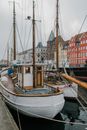 White and Brown Boat on Dock
