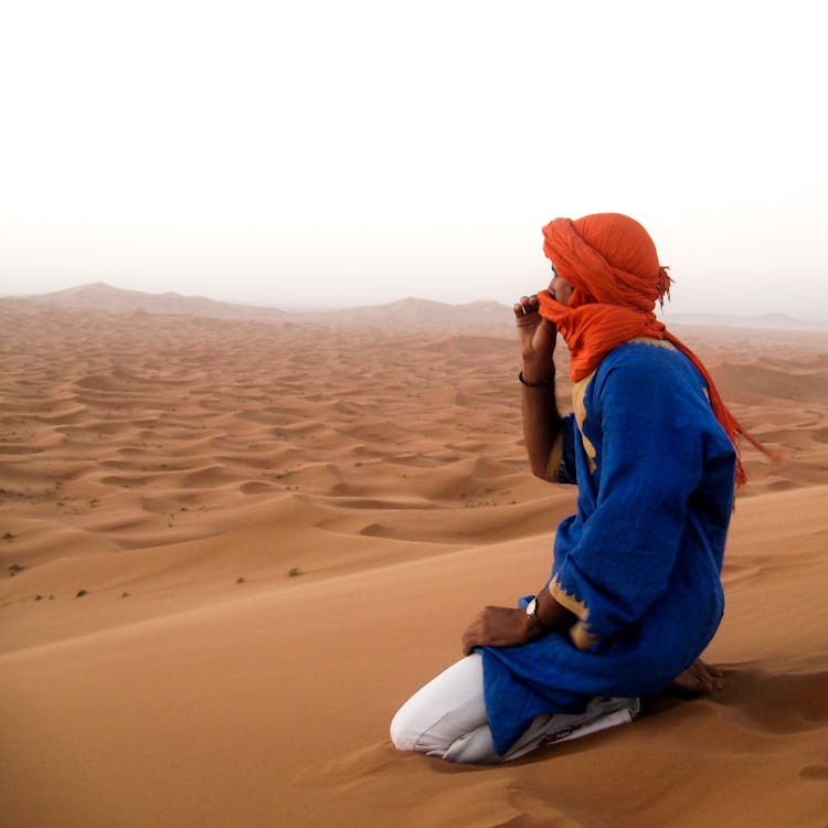 Man Traveling Alone In The Desert