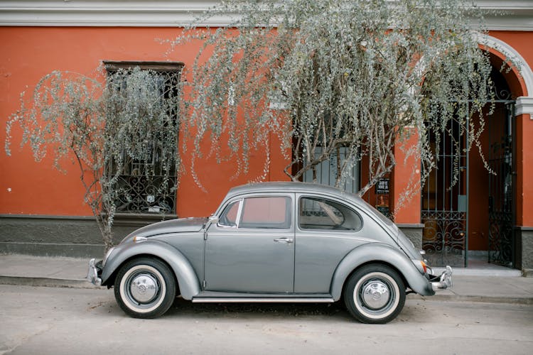 A Parked Silver Beetle Car 