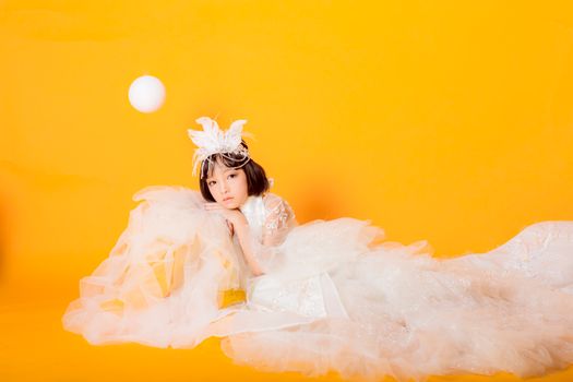Girl in White Dress With Blue and White Floral Crown