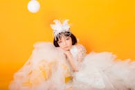 Photo of a Girl Wearing a White Dress