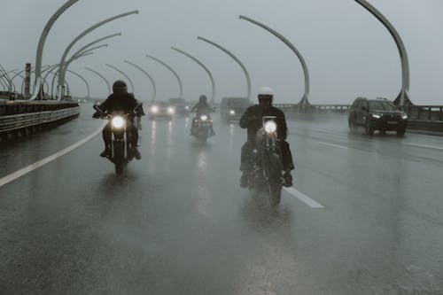 People Riding Motorcycles on the Road
