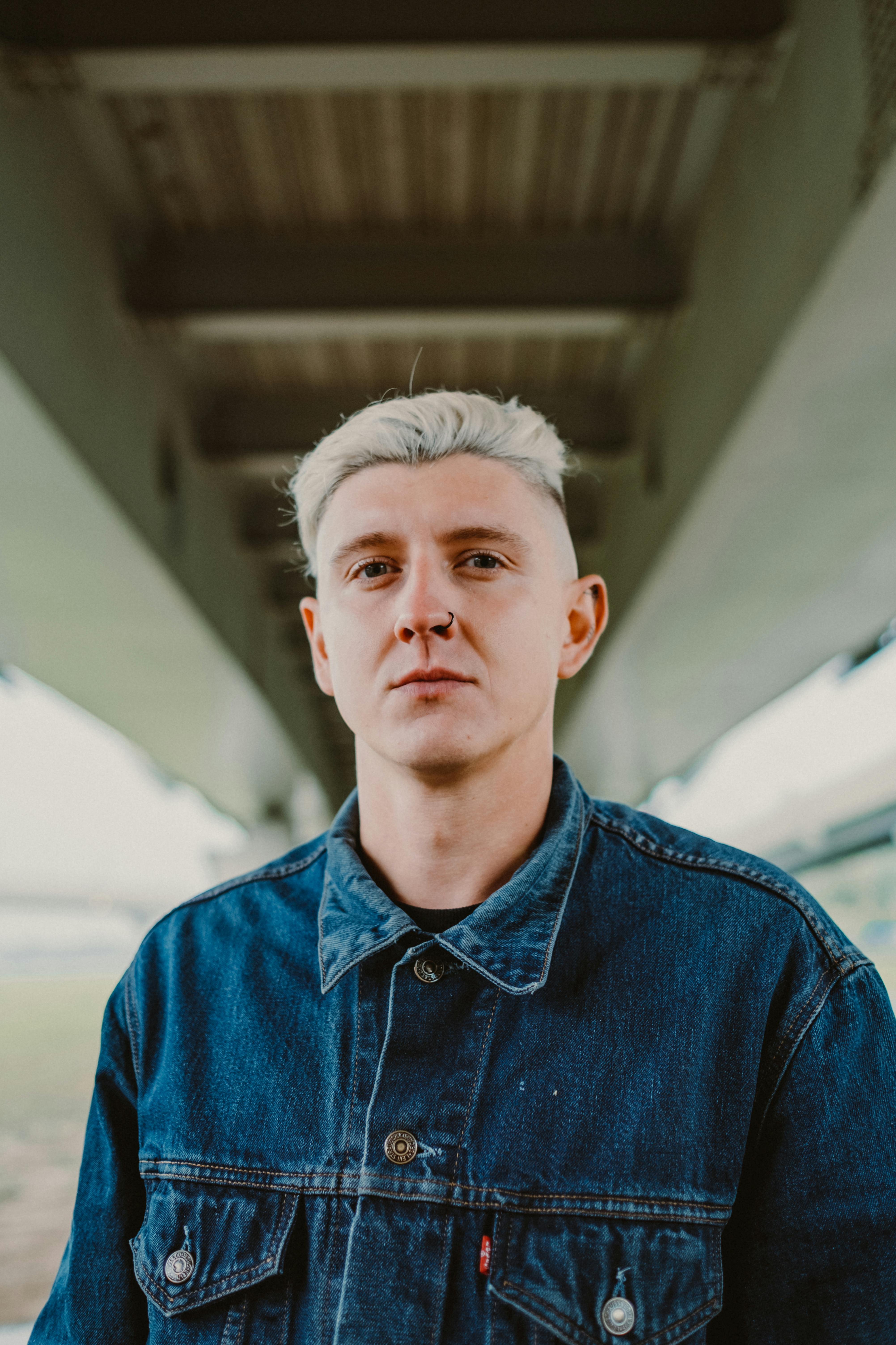 Download A Young Man In A Blue Denim Jacket