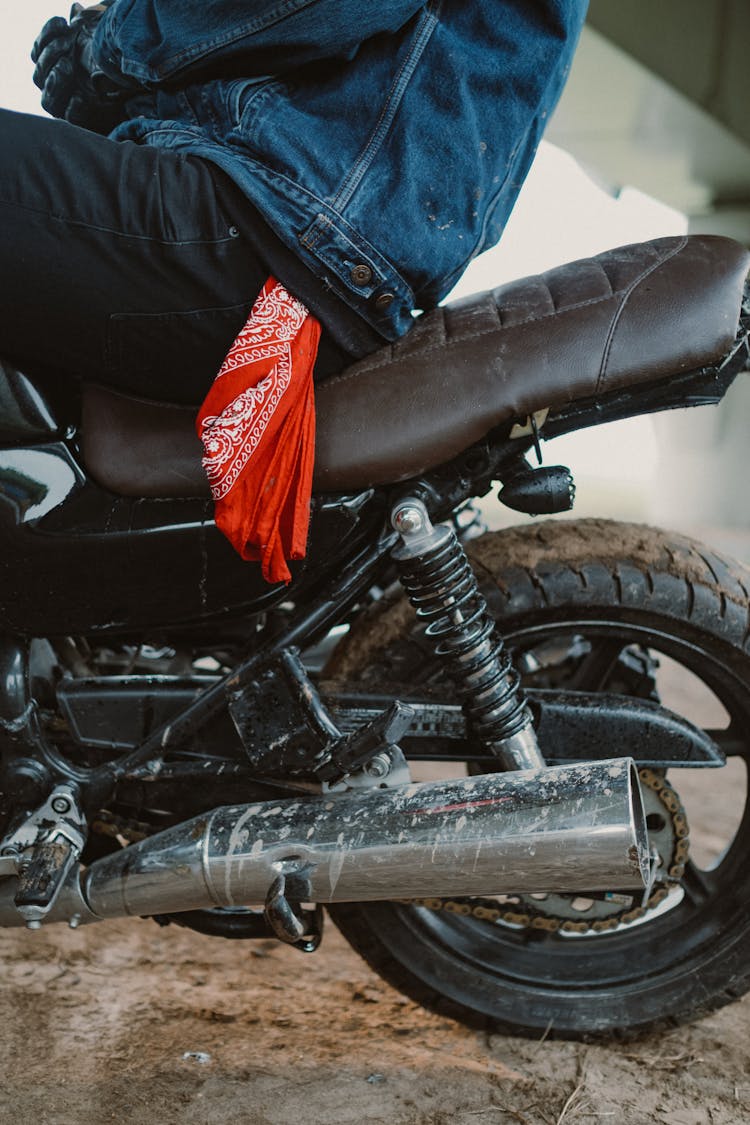 Person With Buff Sitting On Motorbike