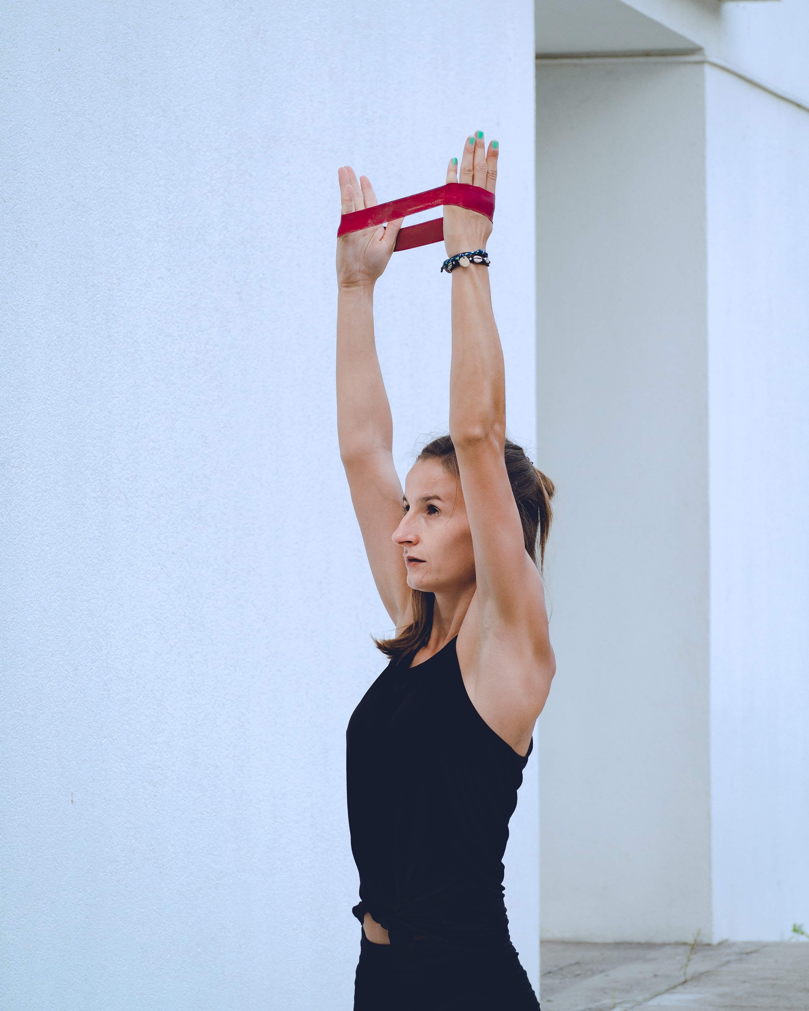 Closeup of hands using resistance band