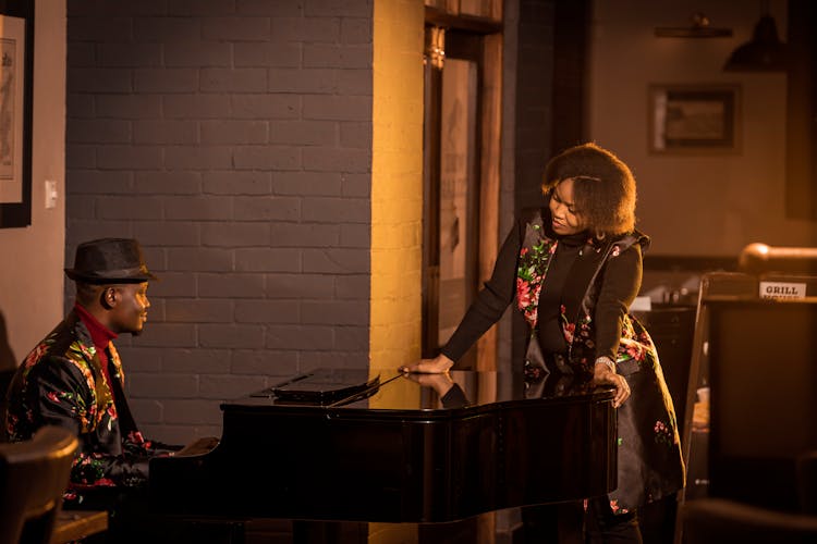 African American Musicians Preforming In Restaurant