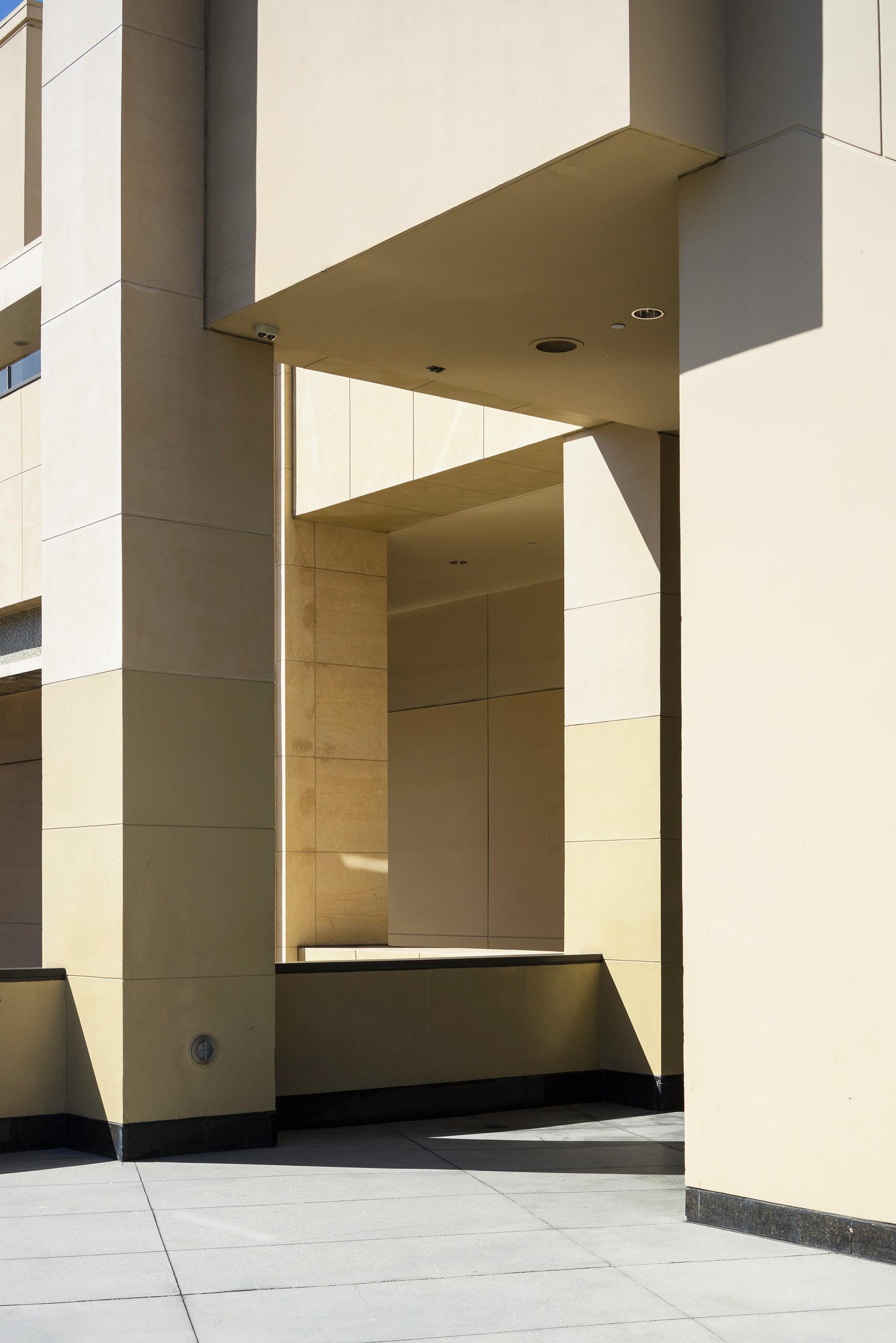 Contemporary building facade highlighting geometric shapes and modern architectural design.