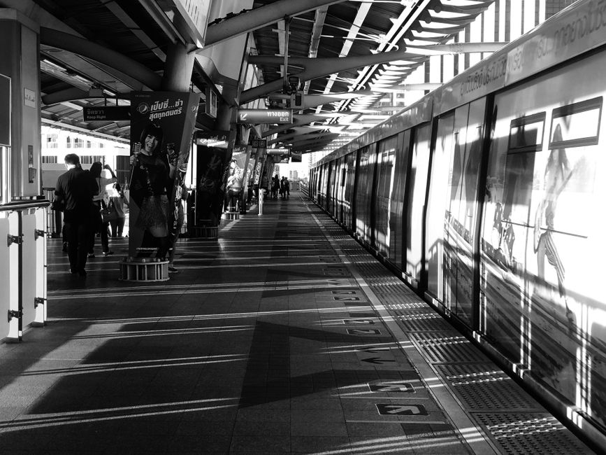 AIS Traveller SIM card advertisement at Suvarnabhumi Airport, Thailand