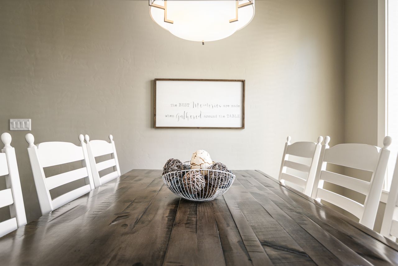Minimalist wooden table with simple place settings