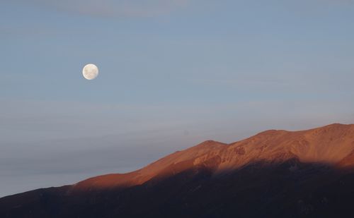Free Scenic view of moonlit mountains during dusk in Canterbury, New Zealand. Stock Photo