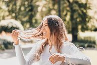 Woman in White Long Sleeve Shirt