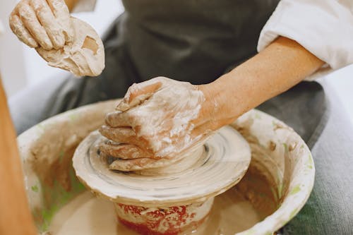Free Person Making Clay Pot Stock Photo