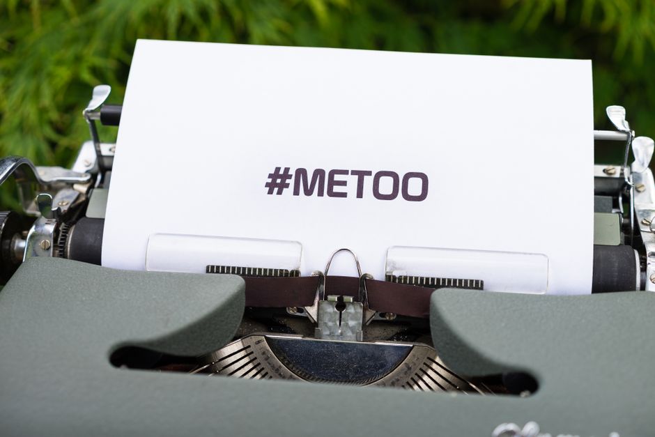 Close-up of a typewriter with the #MeToo message, symbolizing the movement for social justice.