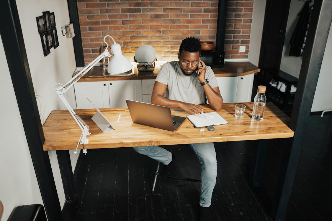 Free Man Working From Home Stock Photo