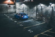 Blue car on parking lot
