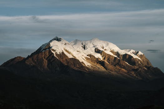 Scenic view of a snow-capped mountain peak in Bolivia, capturing natural beauty and tranquility.
