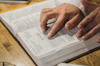 Person Holding White Printer Paper