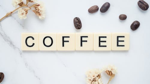 Gratis stockfoto met koffie, koffiebonen, lettertegels Stockfoto