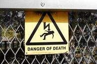 Warning Sign on Fence