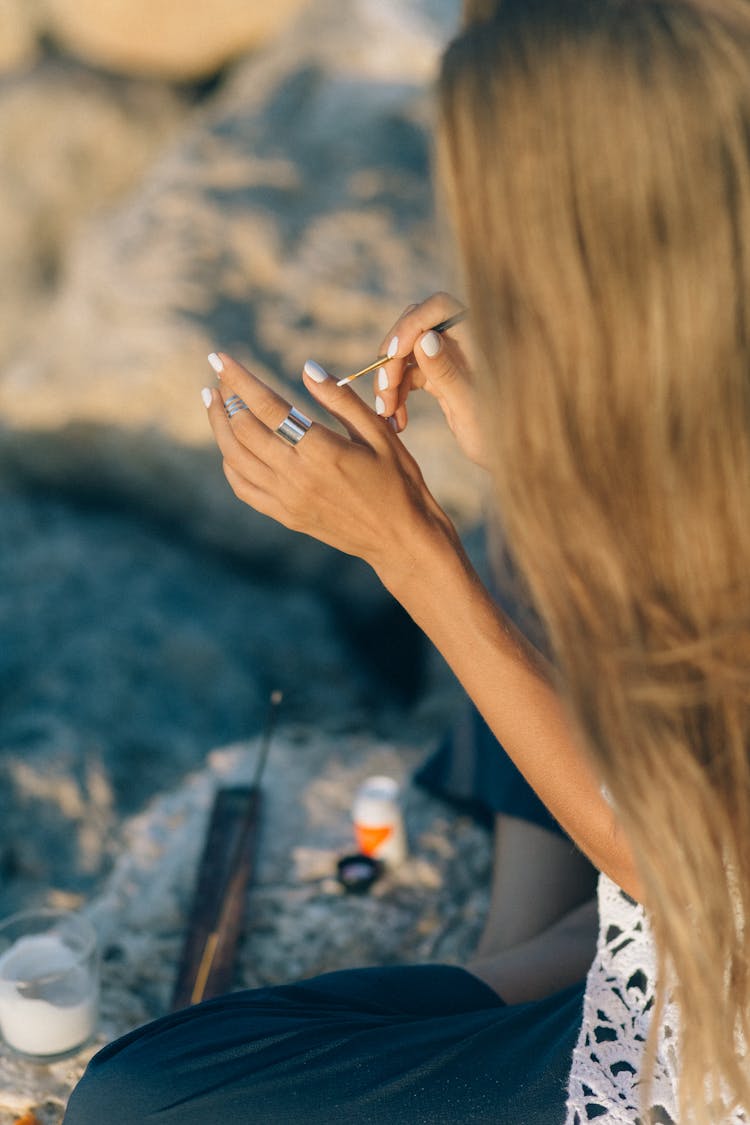 Woman Painting Her Fingers