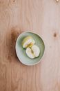 Sliced Lemon on Green Ceramic Plate