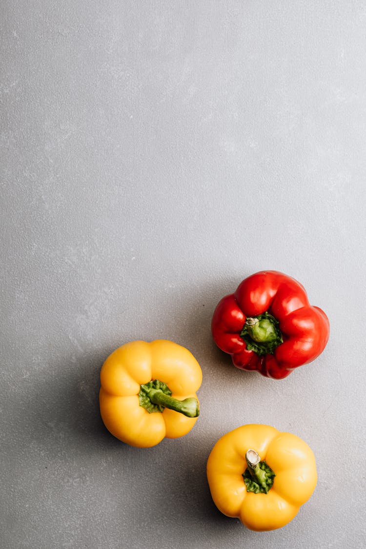 Bell Peppers On Gray Surface