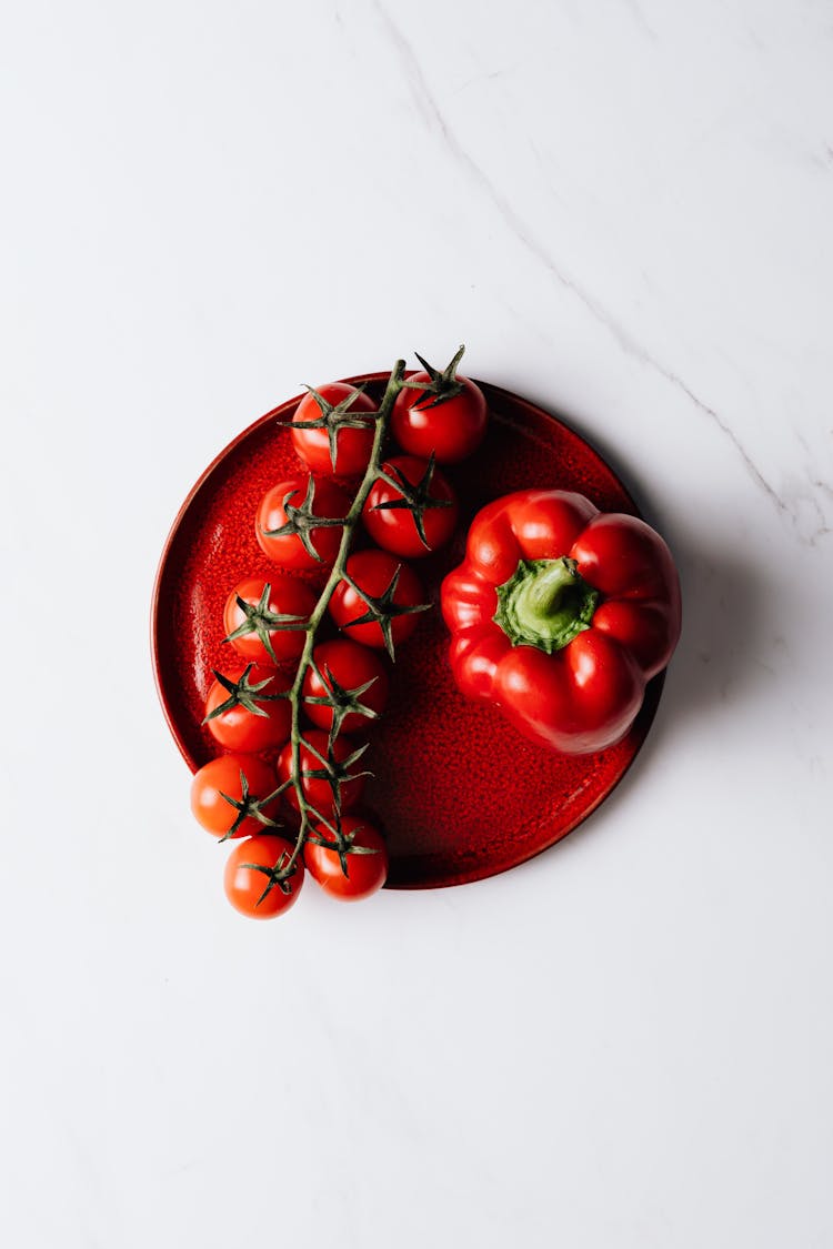 Cherry Tomatoes And Red Bell Pepper On A Plate