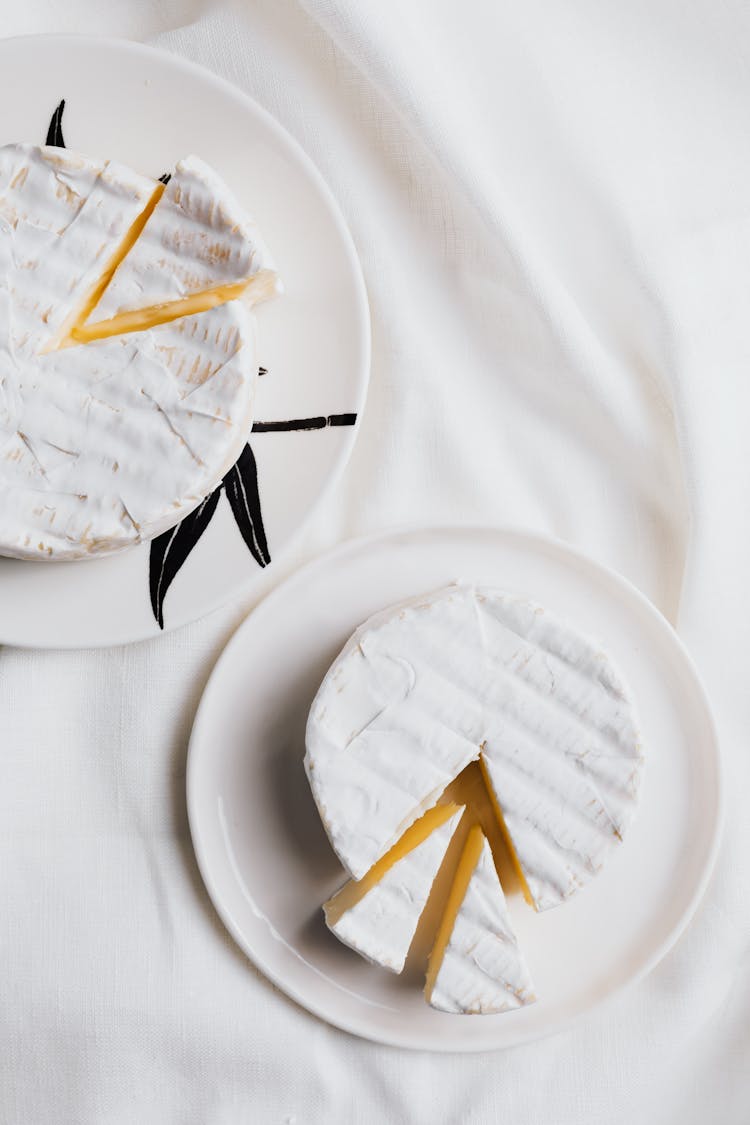 Sliced Cheese On Plates