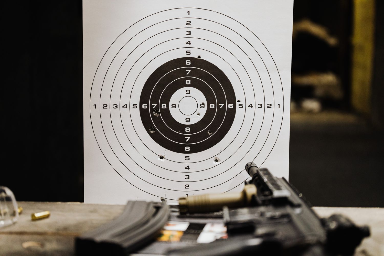 Shooting range target and firearm