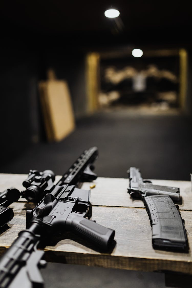 Firearms On The Desk At The Shooting Range