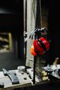 Earmuffs Hanging on a Metal Rod in a Shooting Range