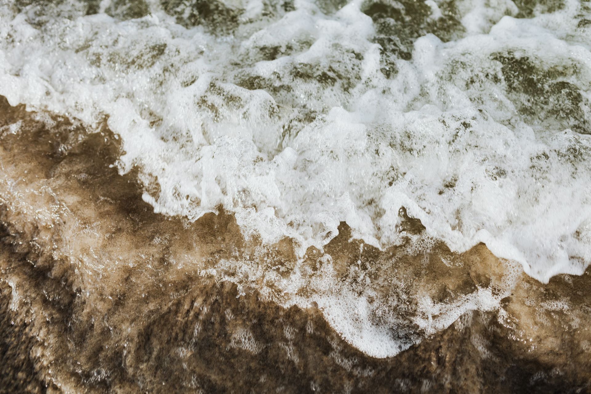 Water Waves on Brown Sand