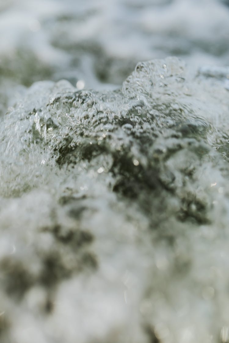 Water With Bubbles In Close-Up Photography